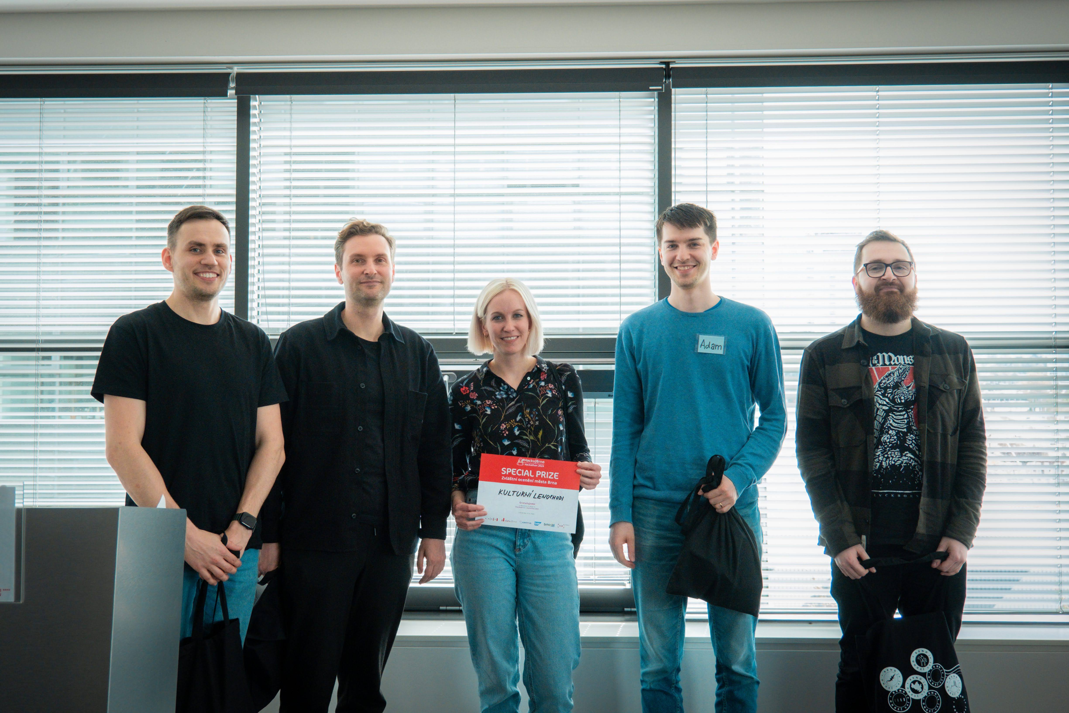 A render of three white cylindrical columns, against a warm creme background